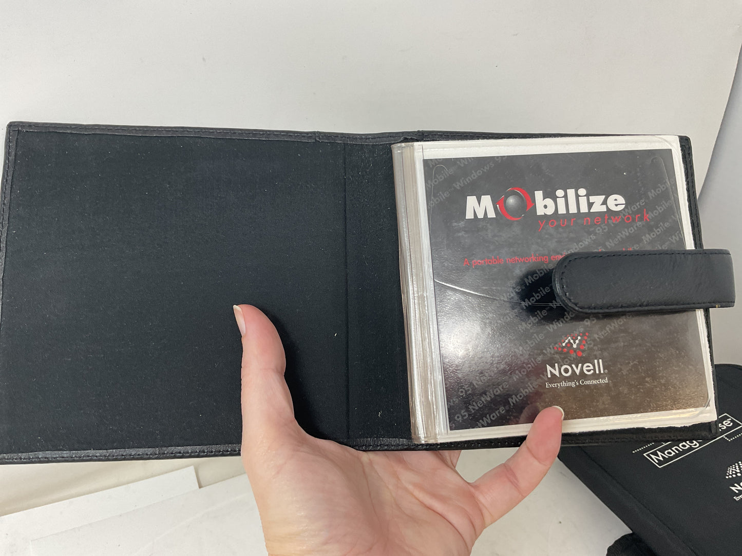 NOVELL NOVELTY MERCH LIGHT-UP PROMO PINS, CD CASES - PREOWNED